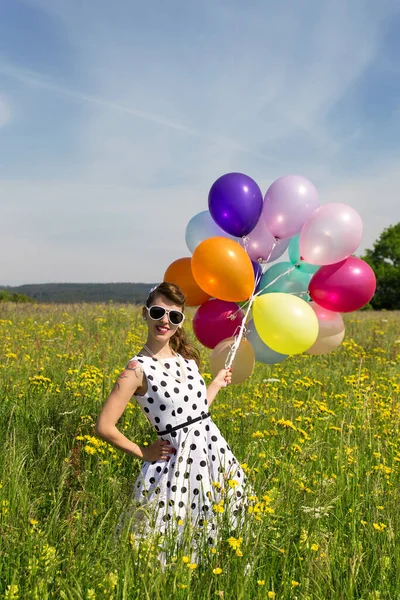 Smiling Rockabilly Girl Colorful Balloons Flowering Meadow — Stock Photo, Image