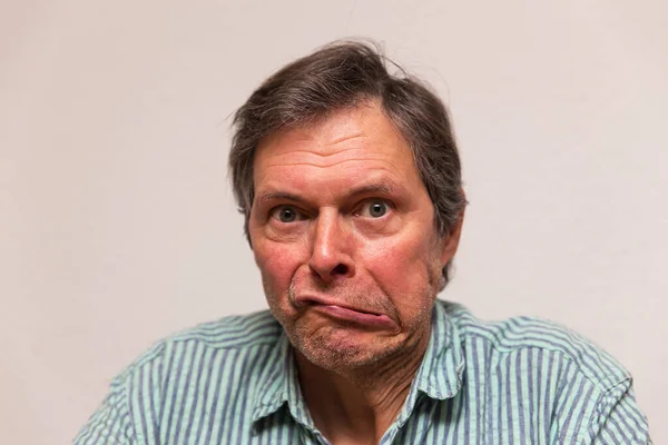 Funny Senior Citizen Making Grimace — Stock Photo, Image