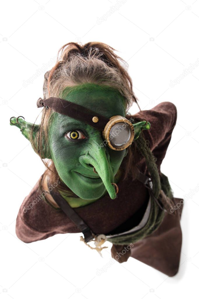 funny green goblin with a monocle, isolated on white