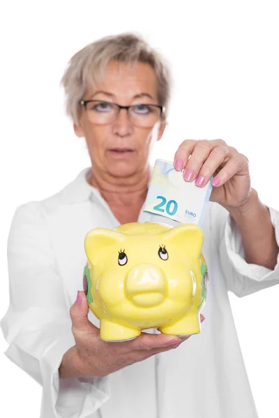 Female Doctor Putting Euro Note Piggy Bank Isolated White — Stock Photo, Image