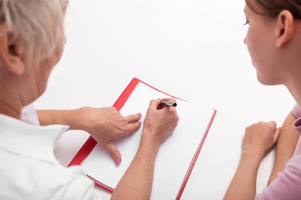 Topview Doctor Patient Doing Some Paperworks — Stock Photo, Image