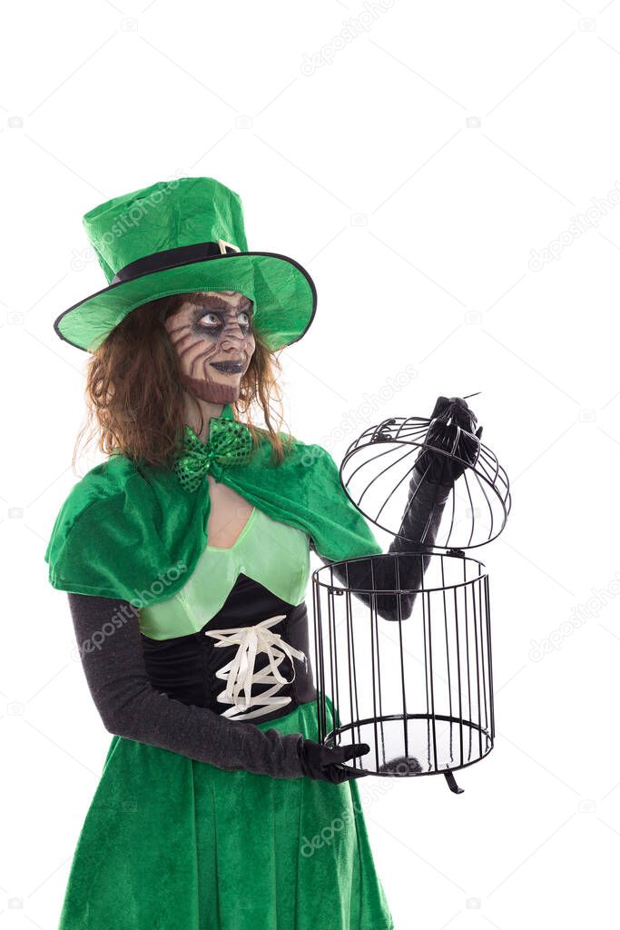 a green Goblin girl holding a birdcage, isolated on white