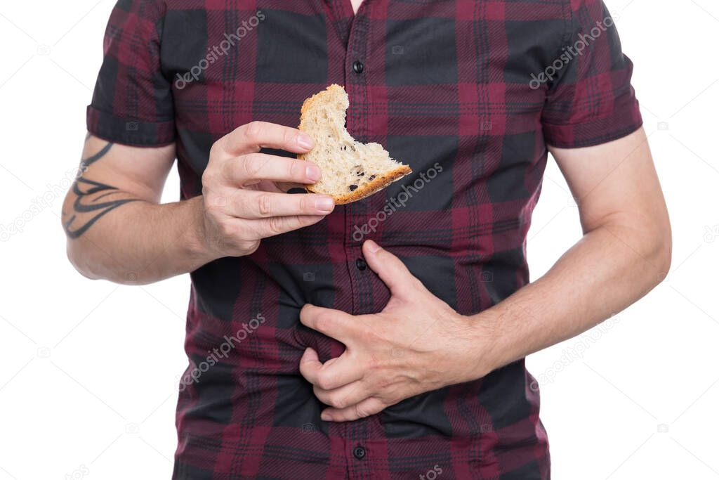 Man holding wheat bread, celiac disease or coeliac condition, isolated on white