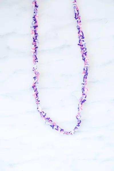 Crocheted pink and purple necklace