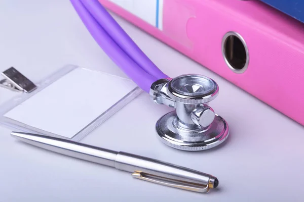 Folder file, stethoscope and RX prescription on the desk. blurred background. — Stock Photo, Image
