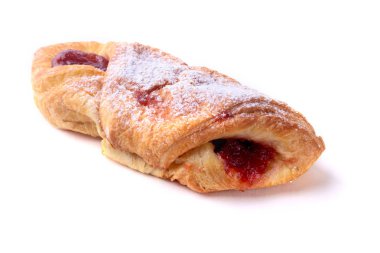 Paskalya kahvaltı reçel ile geleneksel hot cross bun ve süt ile cam ile. Yukarıdan ahşap tablo.