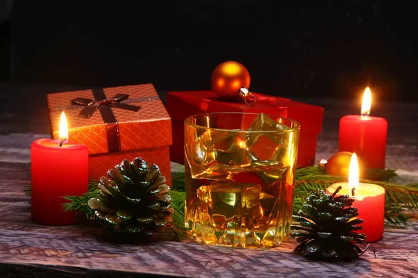 Cognac Whiskey Glass Christmas Balls Gift Boxes Candles New Year — Stock Photo, Image