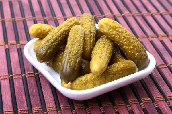 Pickles. Bowl of pickled gherkins cucumber with copy space. Cornichons. — Stock Photo, Image