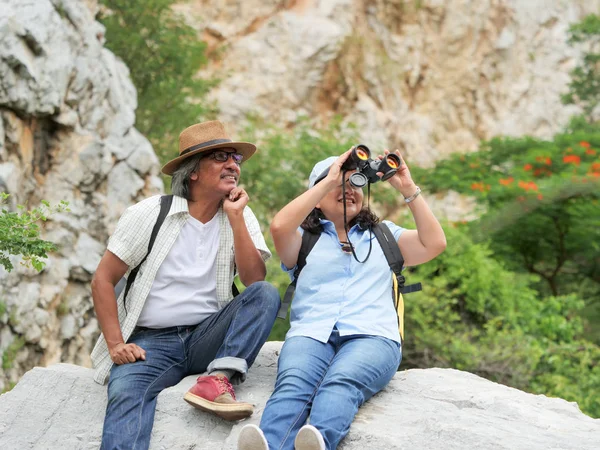 senior couple travel together on a summer vacation