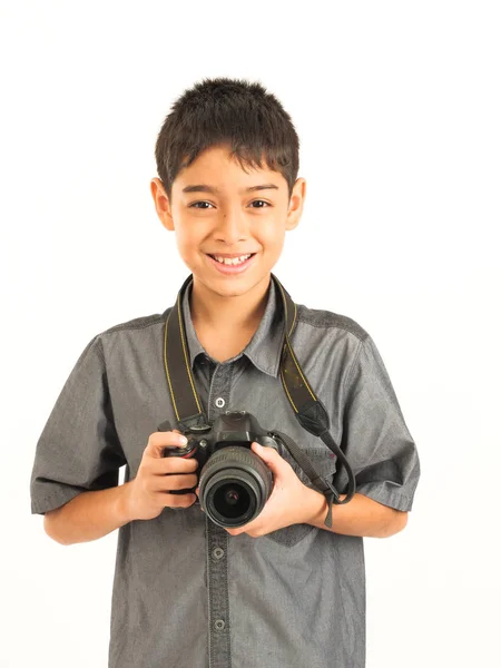 Asian boy with DSLR camera on white background — Stock Photo, Image