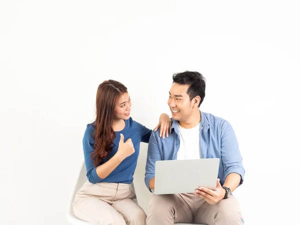 Asian Man and Woman talking with laptop computer for business on — Stock Photo, Image