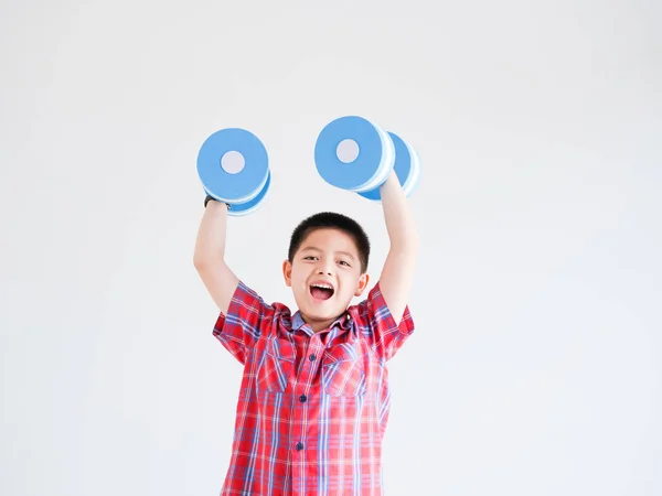 Asian little boy with blue color dumbbell on white background — Stock Photo, Image