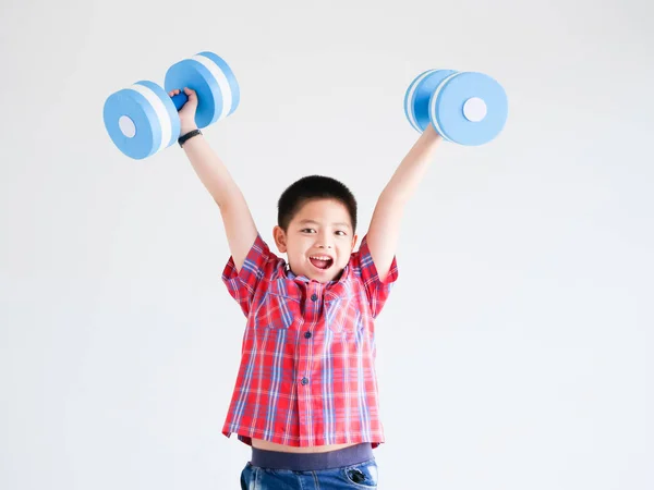 Asian little boy with blue color dumbbell on white background — Stock Photo, Image