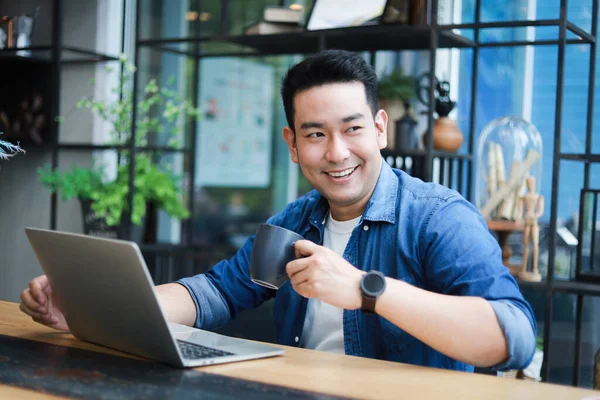 Young Asian Man Blue Shirt Working Laptop Coffee Shop Cafe — Stock Photo, Image