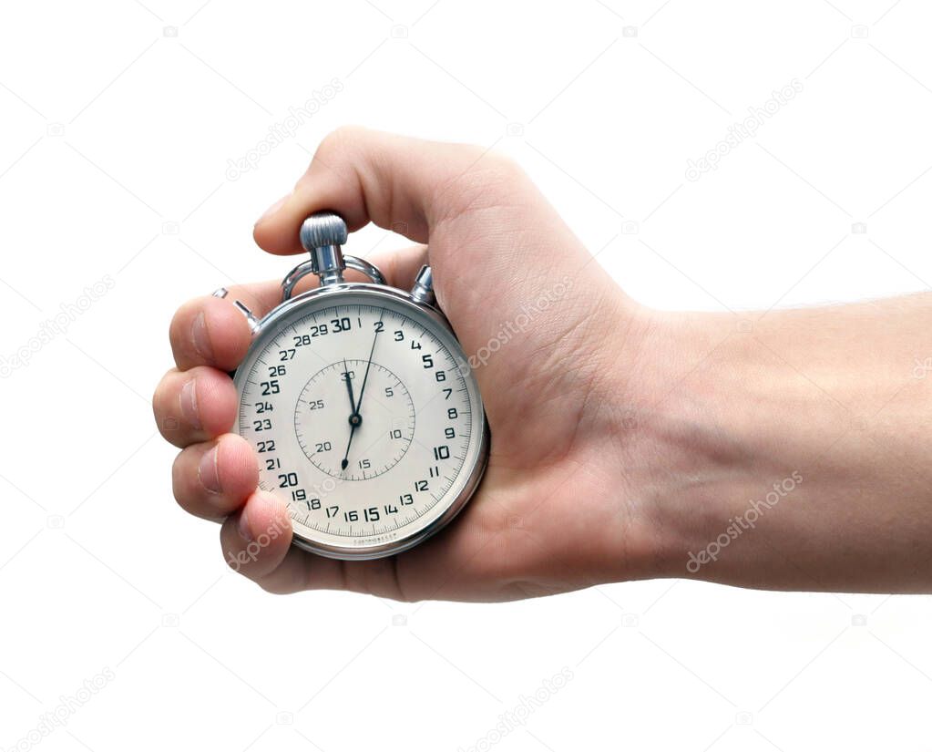 Vintage sport timer stop watch in a man's hand. Isolated on white