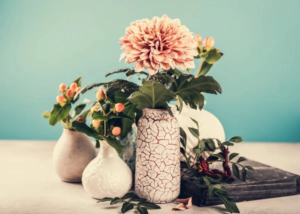 Vase with beautiful chrysanthemum flowers on light table — Stock Photo, Image