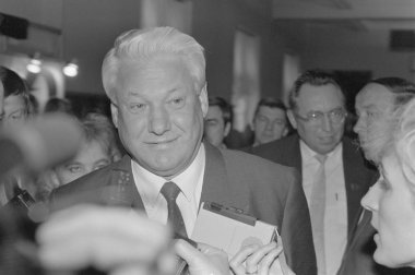 Moscow, Russia - March 28, 1991: Chairman of the Presidium of the Supreme Soviet of the Russian SFSR Boris Nikolayevich Yeltsin talks to correspondents at 3d extraordinary Congress of people's deputies of russian RSFSR. clipart