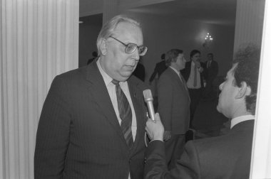 Moscow, USSR - January 20, 1991: Deputy Prime Minister of Latvia Ilmars Bishers talks to journalist at session of Supreme Soviet (soviet parliament) of the USSR clipart