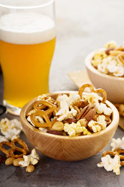 Homemade salty trail mix with beer