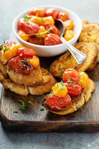 Roasted tomatoes bruschetta — Stock Photo, Image
