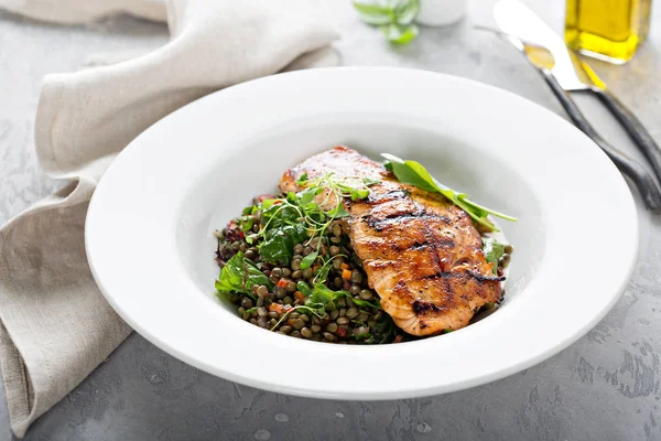Grilled salmon with lentils and swiss chard — Stock Photo, Image