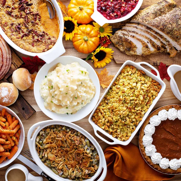 Thanksgiving table with turkey and sides — Stock Photo, Image
