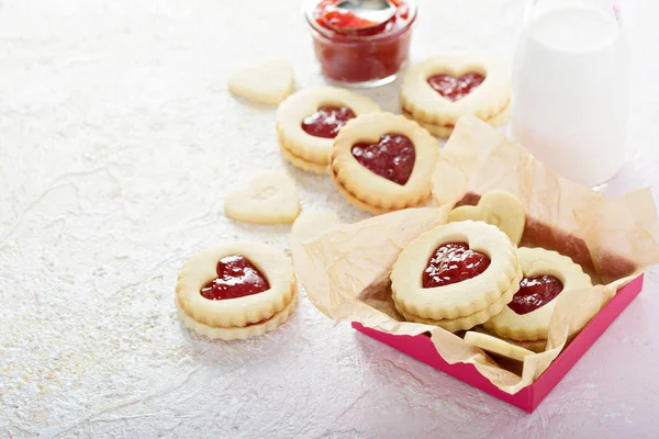 Heart shaped vanilla cookies with jam filling — Stock Photo, Image