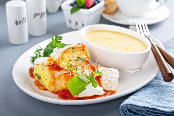 Breakfast egg burrito with grits — Stock Photo, Image