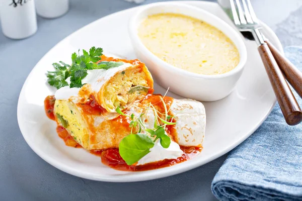 Breakfast egg burrito with grits — Stock Photo, Image