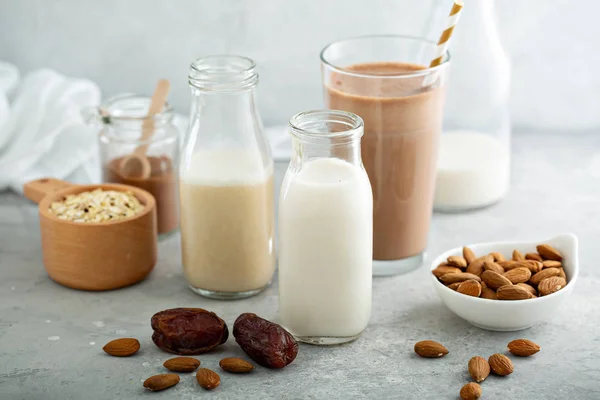 Almond and oat milk sweetened with dates and cocoa — Stock Photo, Image