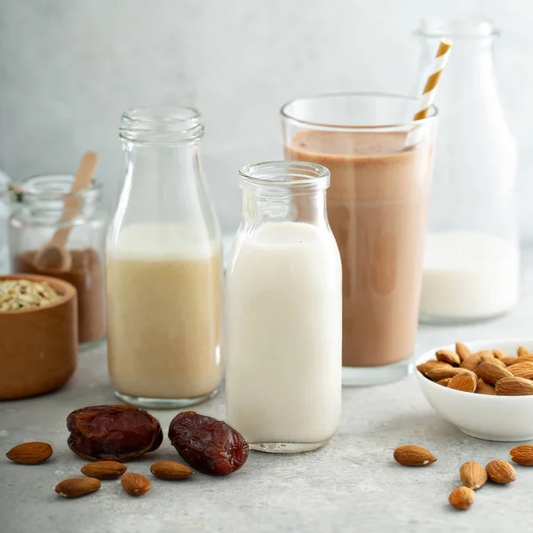 Almond and oat milk sweetened with dates and cocoa — Stock Photo, Image