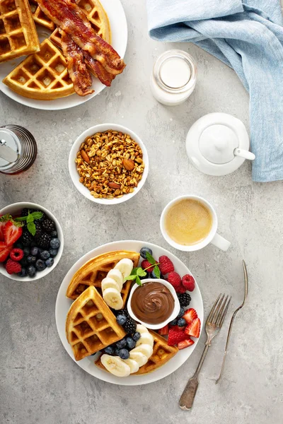 Waffles with berries and chocolate for breakfast — Stock Photo, Image