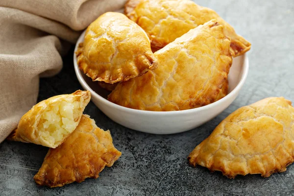Hand pies with potato filling — Stock Photo, Image