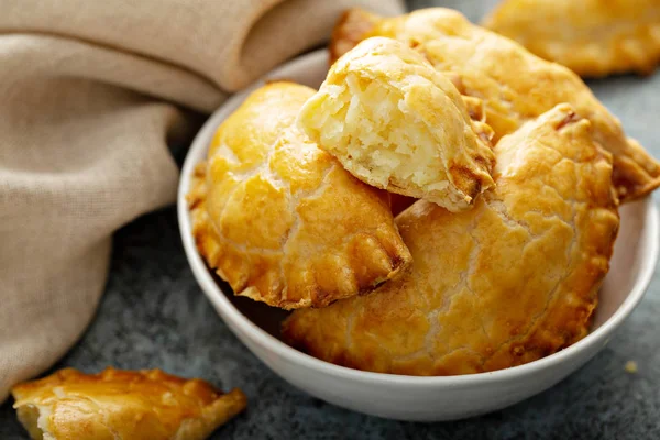 Hand pies with potato filling — Stock Photo, Image