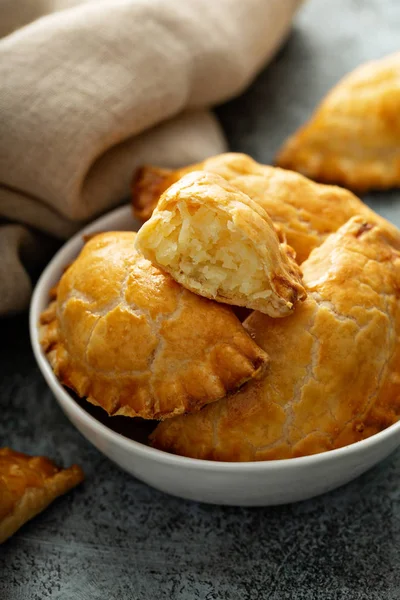 Hand pies with potato filling — Stock Photo, Image