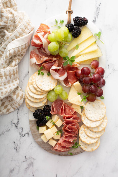 Charcuterie board with cheese and meat