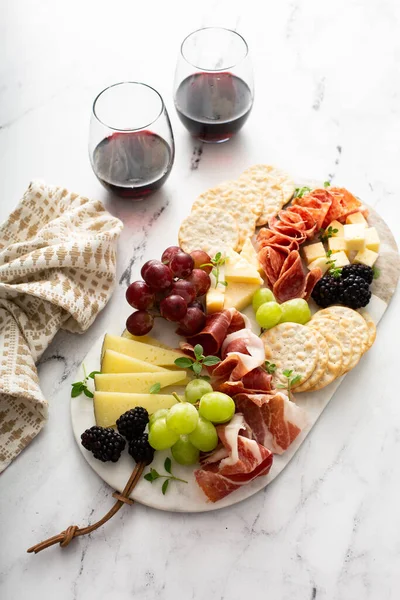 Charcuterie board with cheese and meat — Stock Photo, Image