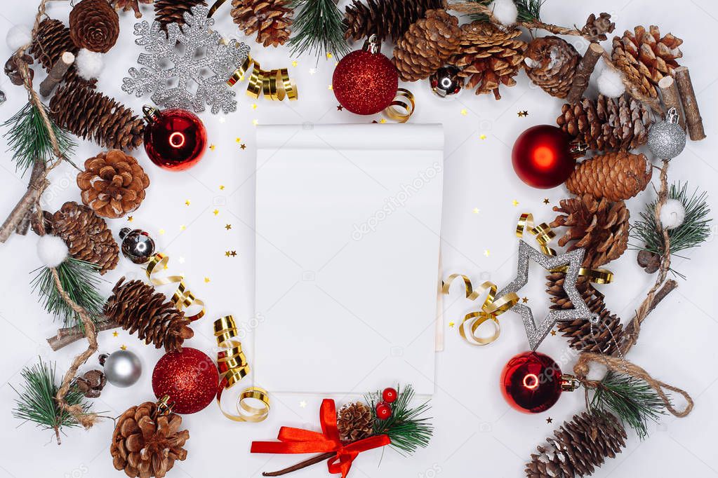 Notepad on Christmas and New Year background. To do list or list of promises, place for your text