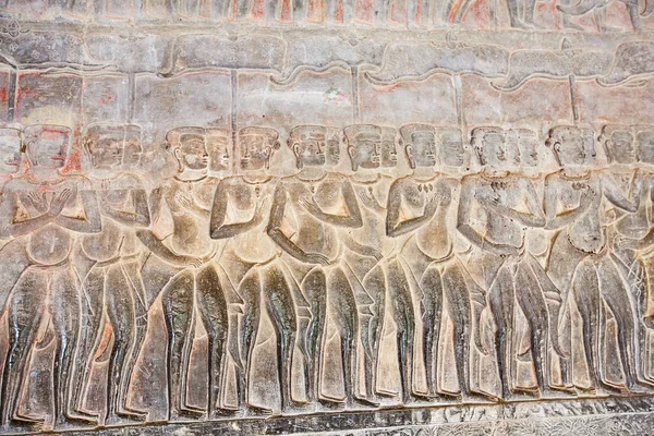 Sten carving, alla runt på väggen vid Angkor Wat. — Stockfoto