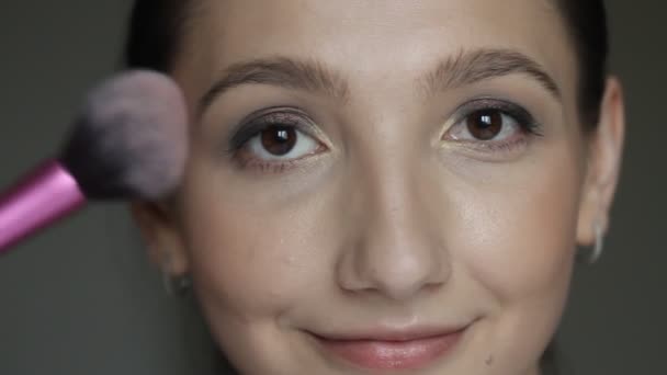 Closeup Portrait Woman Applying Blush Using Makeup Brush — Stock Video
