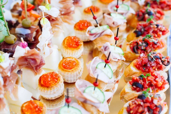 Beautifully decorated catering banquet with different food snack — Stock Photo, Image