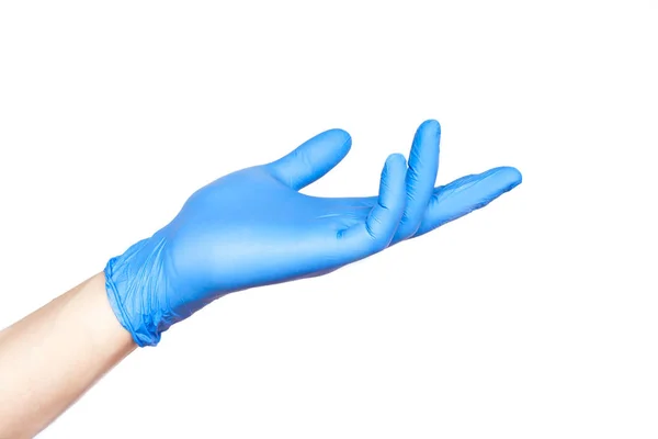 白で隔離された保持位置の青い手袋の医師の手 — ストック写真