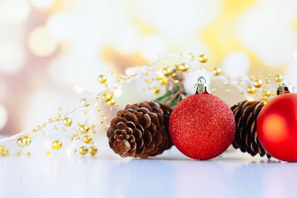 Christmas or new year decorations, red gift box, pine cone — Stock Photo, Image