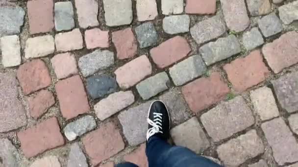 Feet Black Sneakers Walking City Stepping Sett Road — Stock Video