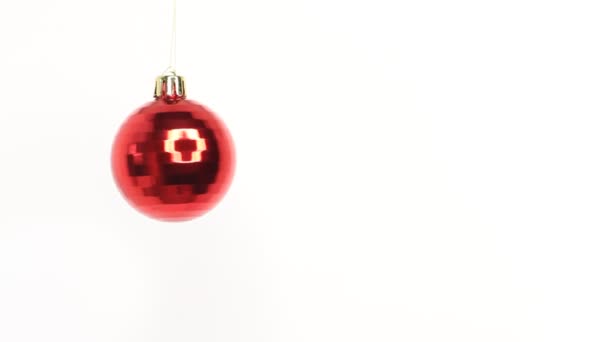 Christmas New Year Red Ball Rotating Decoration White Background Merry — Stockvideo