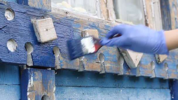 Wood Painting Hand Blue Rubber Glove Paints Wooden Window Frame — Stock Video