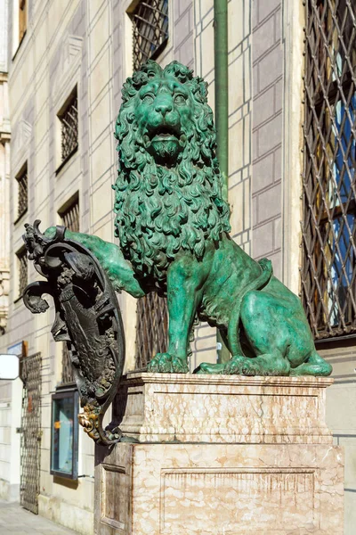 Bronze lion (XIX c.) in front of the Alte Residenz, former royal palace of the Wittelsbach, Munich, Germany