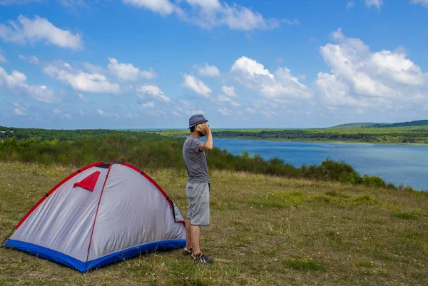 Young Camper Making Phone Call While Standing Tent Watching Beautiful — Stock Photo, Image