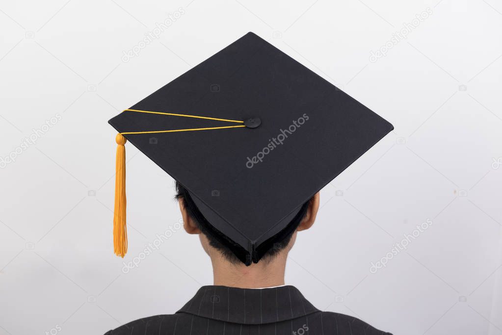 Behind the graduates wearing black hat on isolated backgroud.