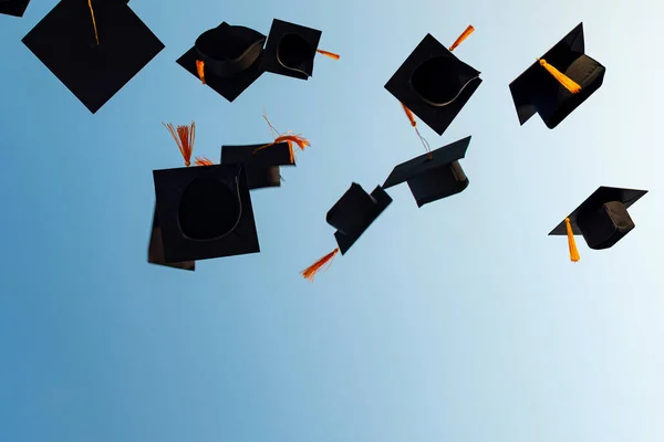 Graduates Throw Black Hats Sky — Stock Photo, Image